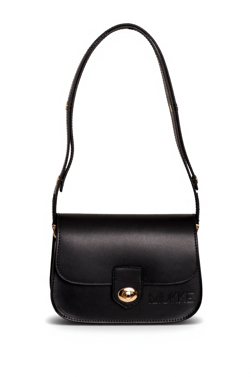 Mała torebka z regulowanym paskiem Wolna